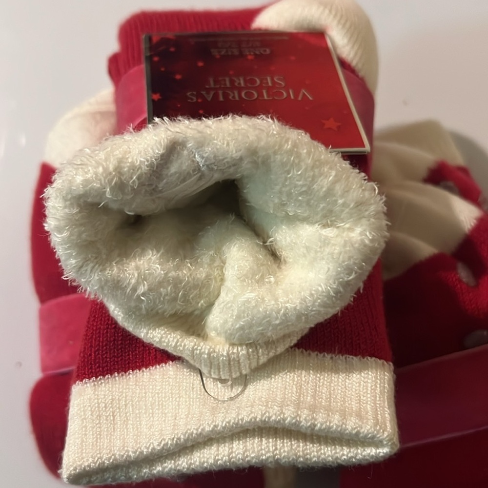 2 pairs of red and white Victoria’s Secret holiday socks. - Picture 2 of 3
